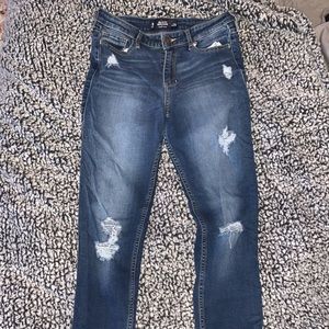 High waisted distressed jeans